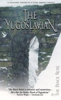 stone bridge with arched passage surrounded by snow